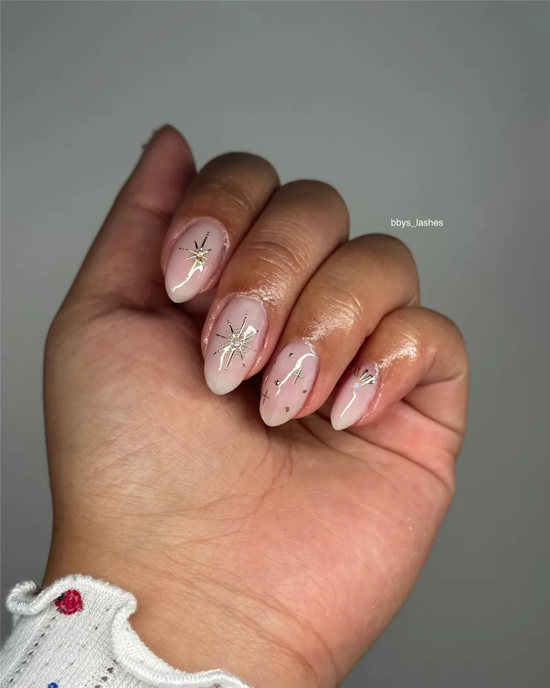Nude almond nails with gold star detail by BY BBYS, lash and nail studio in Kelham Island, Sheffield