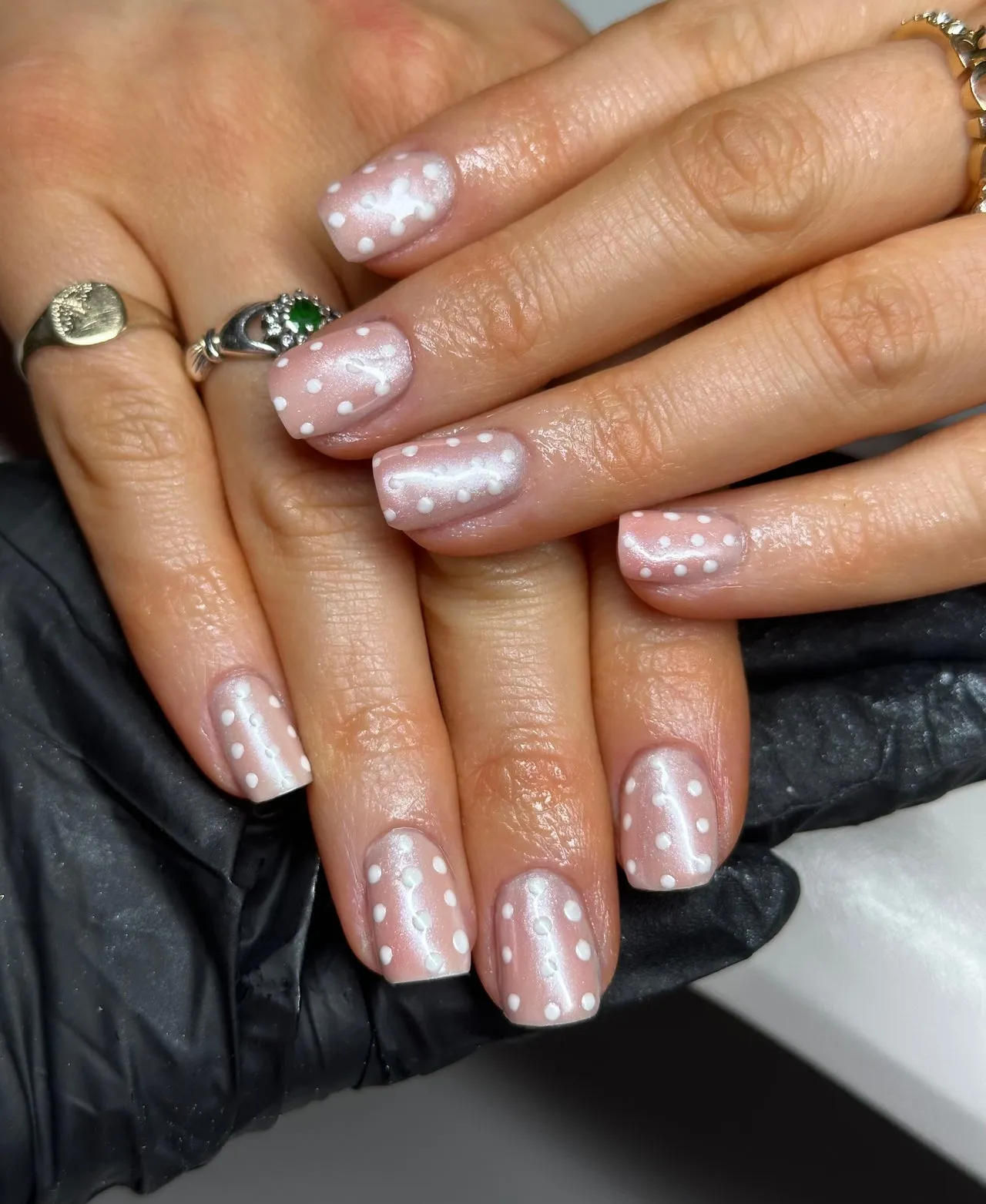 Short pearl nails with white dots by BY BBYS, lash and nail studio in Kelham Island, Sheffield